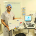 Dr V.M. Ramloutan in theatre with Rezūm equipment used in the treatment of enlarged prostate (BPH)